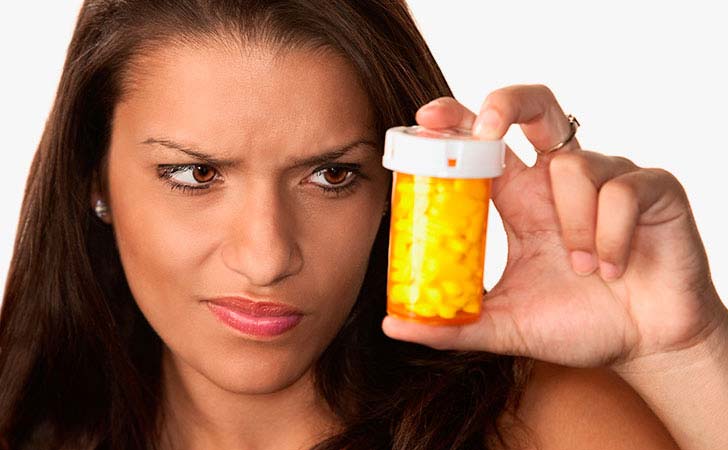 skeptical-woman-pills.jpg